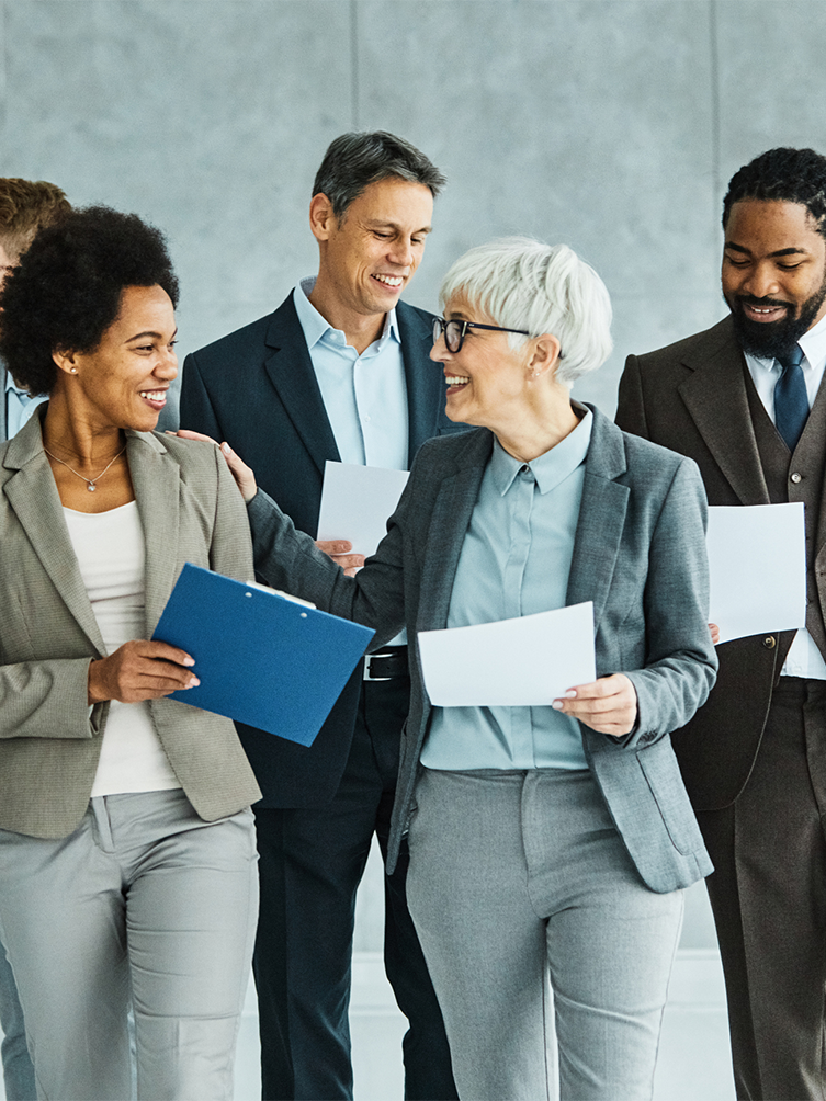 mature woman in a group of businesspeople