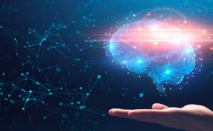 Hand holding a brain in the air (illustration)