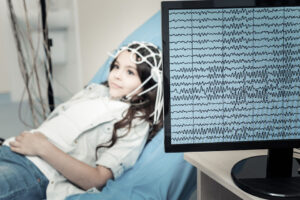 Girl with autism getting an EEG