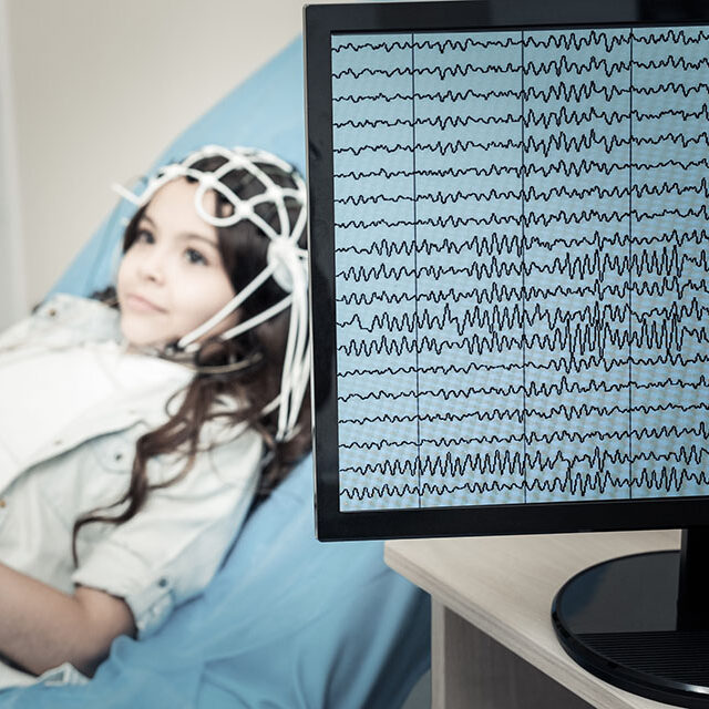 Girl with autism getting an EEG